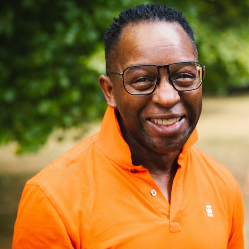 Man smiling at the park
